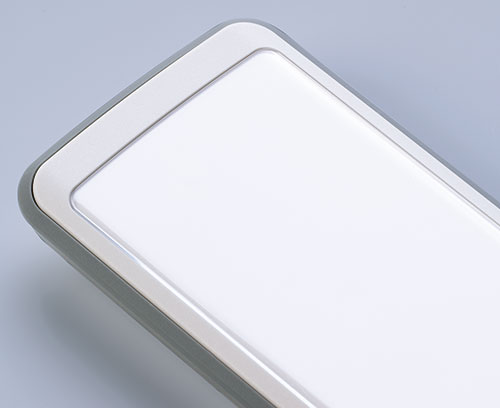 The contoured front screen (accessory) protects the displays underneath