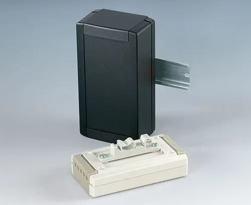 Peça de fixação para trilhos DIN